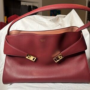 Ferragamo Hug soft shoulder bag (L) in College Red/Pink